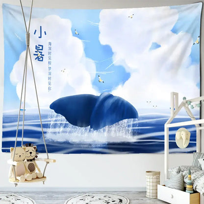Whimsical teal and white dream whale tapestry wall hanging featuring blue whale tail with clouds and birds decorbites dream whale decor