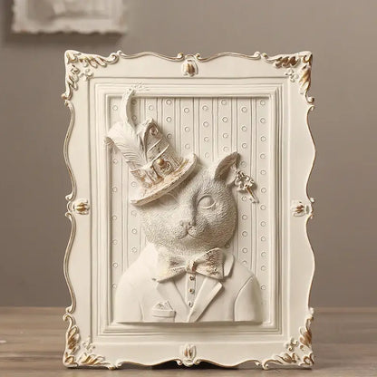 White and gold ornate wall decoration frame featuring a sculpted cat in formal attire for bedroom decor
