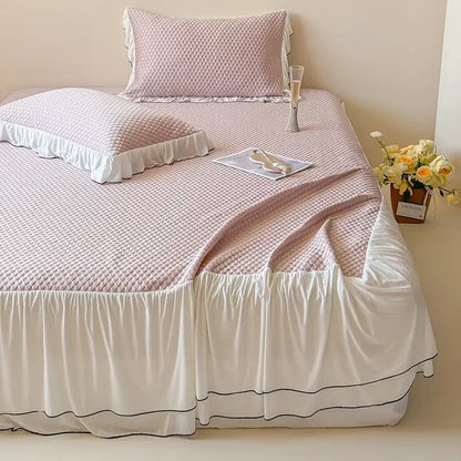 Pink quilted bedding set with white ruffled trim and black piping for decorbites cool feeling bedroom decor