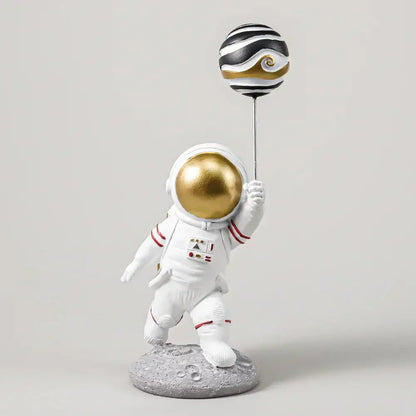White and gold astronauts figurines with gold helmet holding striped balloon for living room decorbites astronauts figurines