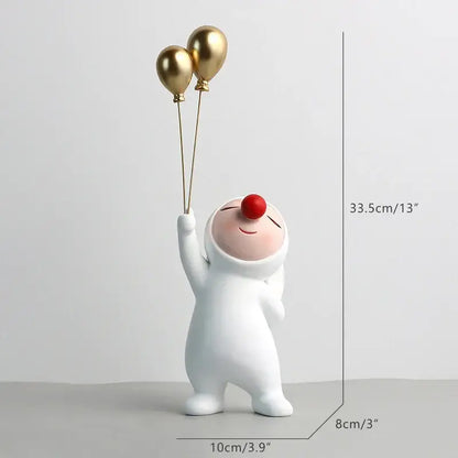 White and gold ceramic clown bust sculpture holding three gold balloons for kids room candy tray decor