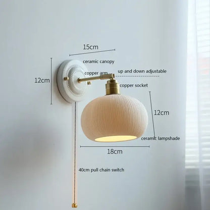Cream-colored ceramic led wall light with ribbed lampshade and brass accents for bedroom decorbites ceramic led wall use