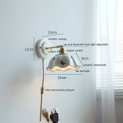 White and gold ceramic led wall light with delicate butterfly fluted shade and brass-finished copper arm for bedroom decorbites ceramic led