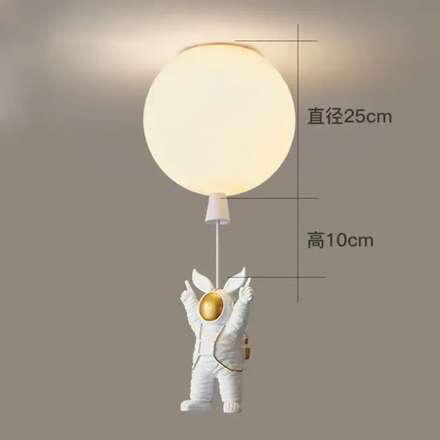 White and gold decorbites astronaut space ball ceiling lamp holding a glowing spherical light for kids room decor