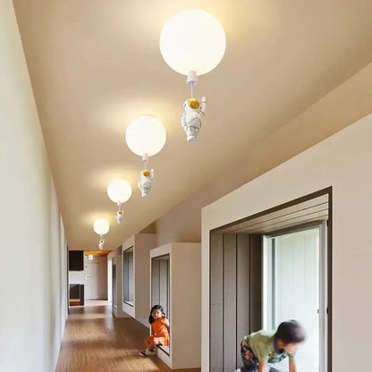 White and gold decorbites astronaut space ball ceiling lamp with softly glowing spherical bulbs for kids room