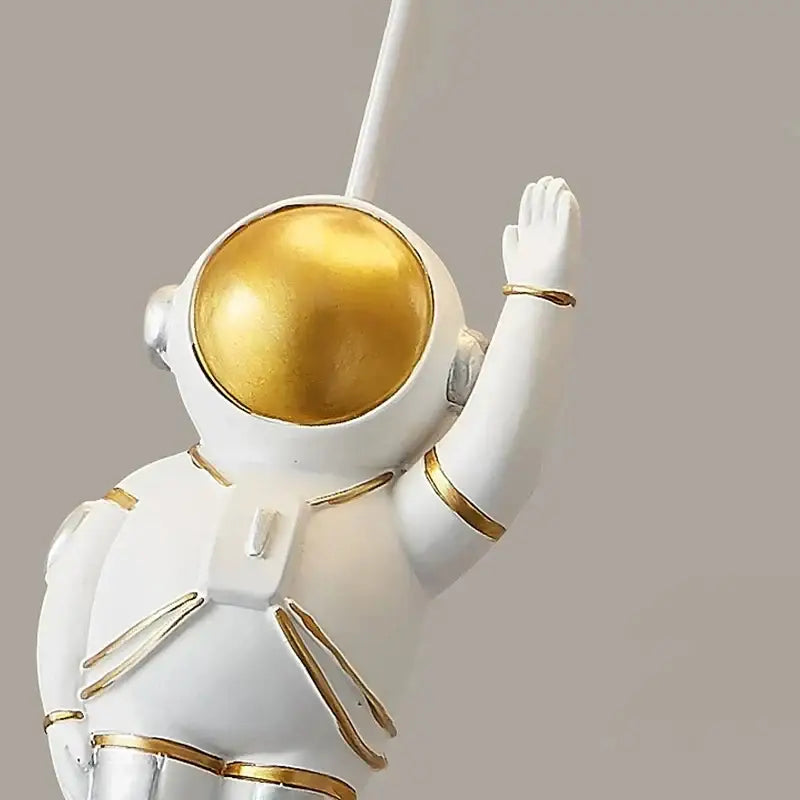 White and gold decorbites astronaut space ball ceiling lamp with metallic accents designed as wall-mounted lighting