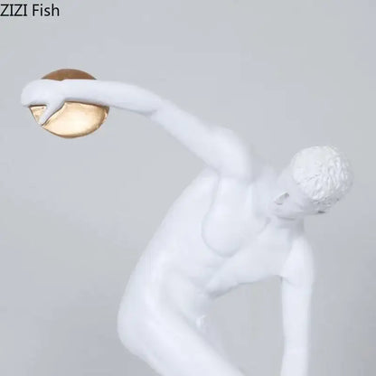 White and gold discus thrower resin sculpture of a male athlete in mid-throw for living room decor