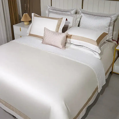 Elegant white egyptian cotton bedding set with gold embroidery featuring satin duvet cover and subtle textured detailing