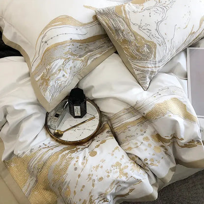 White and gold marble-patterned egyptian cotton luxury bedding set with elegant flowing designs for bedroom use