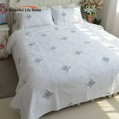 White and gray blue cotton quilted embroidered bedspread set featuring intricate circular and diamond patterns