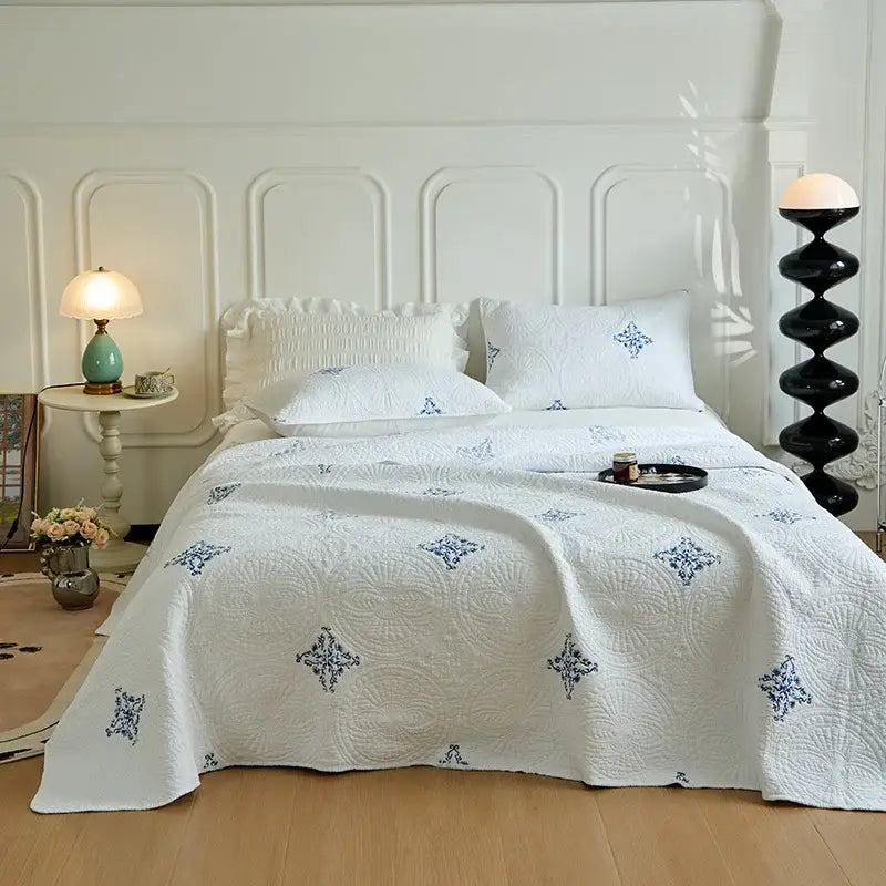White and gray blue cotton quilted embroidered bedspread set featuring intricate blue starburst patterns for bedroom decorbites cotton quilted