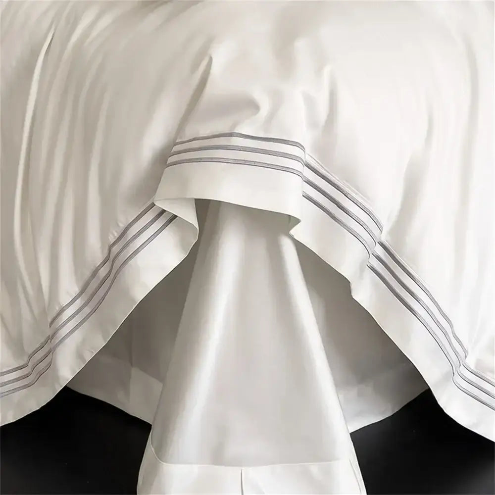 White satin pillowcase with three parallel gray stitched stripes from decorbites 1200tc embroidered egyptian cotton bedding set