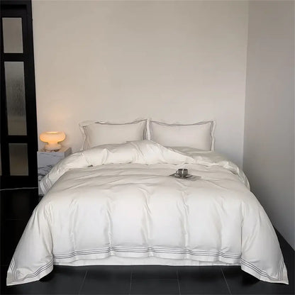 White satin-like egyptian cotton duvet cover with subtle gray piping from decorbites 1200tc embroidered bedding set