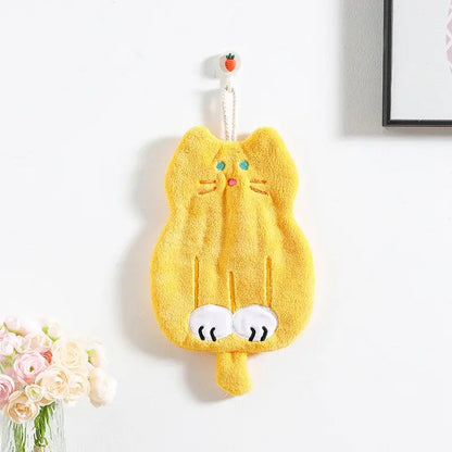 A bright yellow plush coral plush cat hand towel with embroidered blue eyes and pink nose for bathroom decorbites coral plush decor