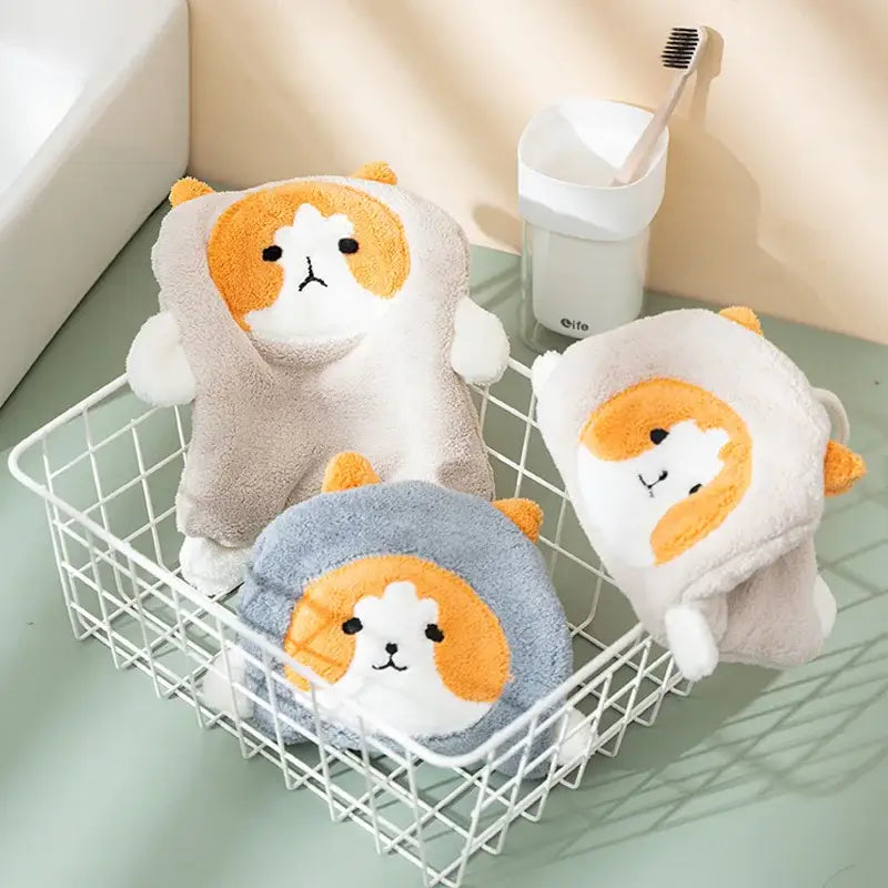 Soft beige and gray coral plush cat hand towel with orange accents for bathroom decorbites coral plush bathroom decor