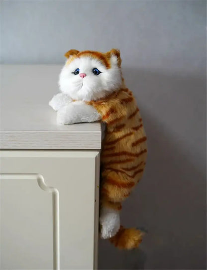 White and tan hanging cat plush doll with soft orange and white fur blue eyes and pink nose perfect for living room decorbites decor