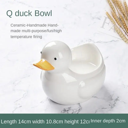 White ceramic dessert bowl with glossy finish and orange beak suitable for decorbites duck ceramic serving dish