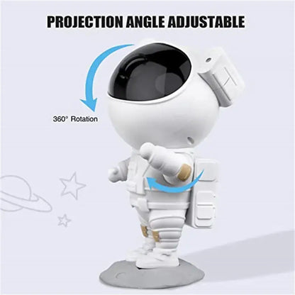 White astronaut star projector night light with black visor and gold accents on gray base for bedroom galaxy decor