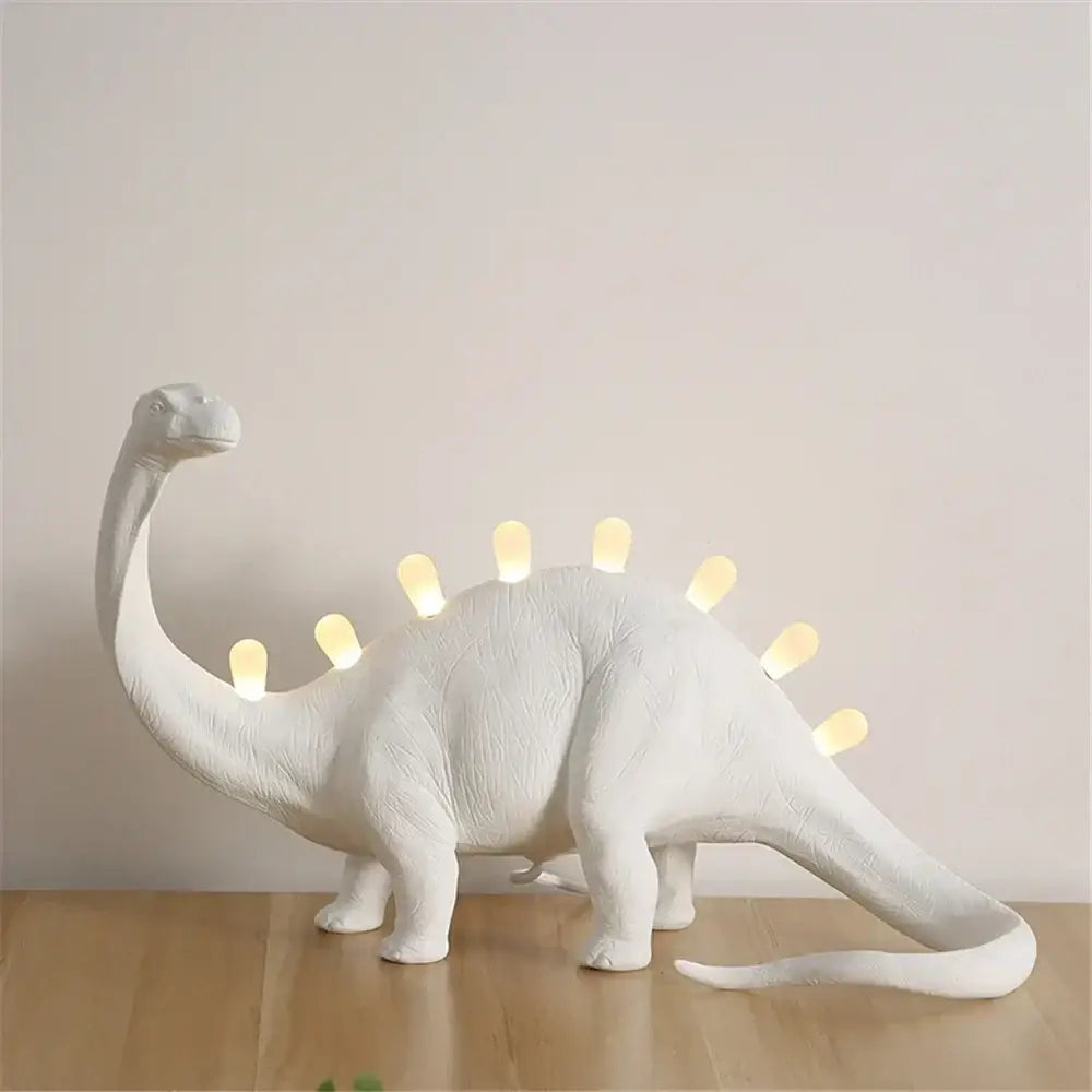 White brontosaurus t-rex dinosaur resin led desk lamp with glowing yellow lights for bedroom lighting