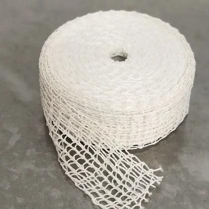 White woven mesh butcher’s string roll coiled with central hole for kitchen display and meat netting use