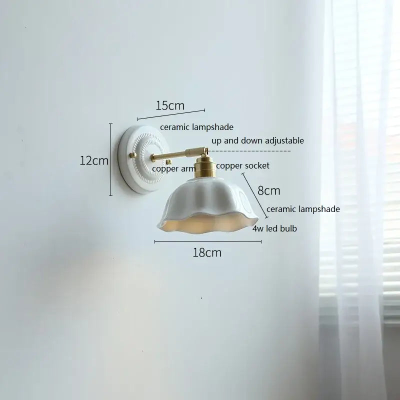 White butterfly ceramic led wall lamp with scalloped fluted ceramic lampshade and brass copper arm mounted on wall