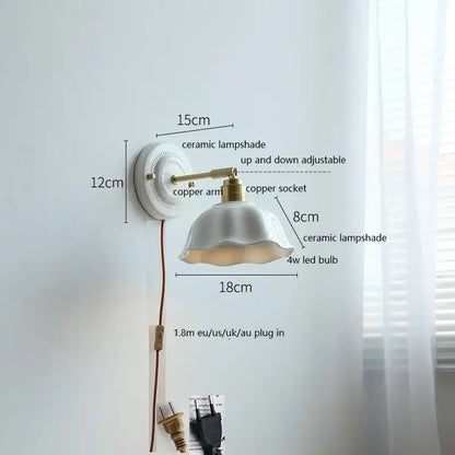 White butterfly ceramic led wall lamp with scalloped white ceramic shade and adjustable brass copper arm for bedroom use