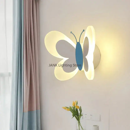 White butterfly led wall lamp with soft glowing translucent wings and solid blue body for bedroom decorbites butterfly led light