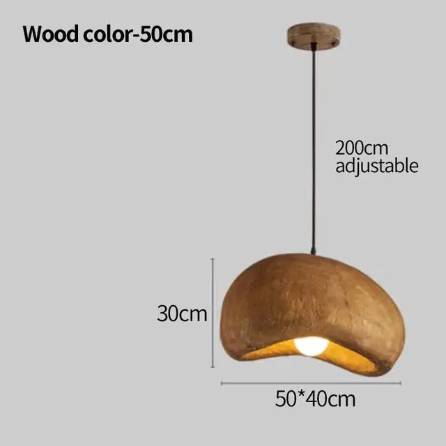 A rustic wood-toned pendant light with rounded organic shape and adjustable 200cm chain from decorbites cement wind cloud collection
