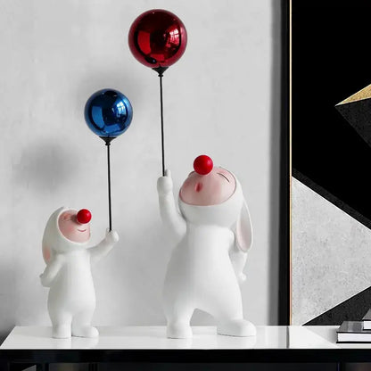 White ceramic balloon rabbit resin ornaments featuring clown figurines holding shiny red and blue balloons for desk decor