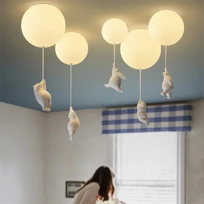 White ceramic bear cartoon pendant lamp with softly glowing spherical orbs for kids bedroom lighting