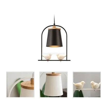 Black cylindrical pendant light with wooden top and base featuring two white ceramic birds decorbites bird led design