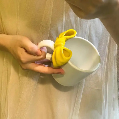 White ceramic bow knot mug with bright yellow decorbites bow knot handle for dining room porcelain cup use