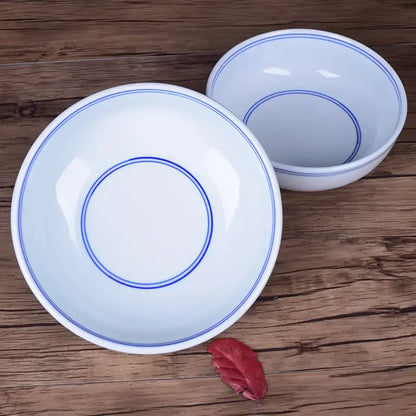 White ceramic noodle bowl with delicate blue concentric circles on rim and interior by decorbites blue for dining room use