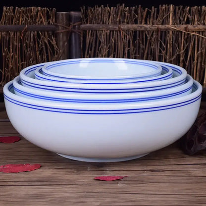 Set of four white ceramic noodle bowls with elegant blue concentric stripes by decorbites blue for dining tableware