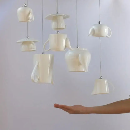White ceramic teapot ceramic led pendant chandelier with hanging tea cups for warm kitchen lighting decorbites pendant lights