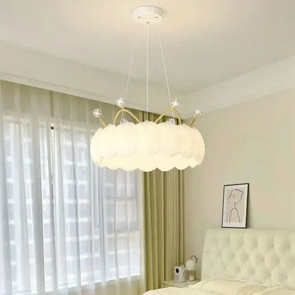 White cloud led crown small chandelier with gold-toned crown accents and crystal embellishments for bedroom lighting