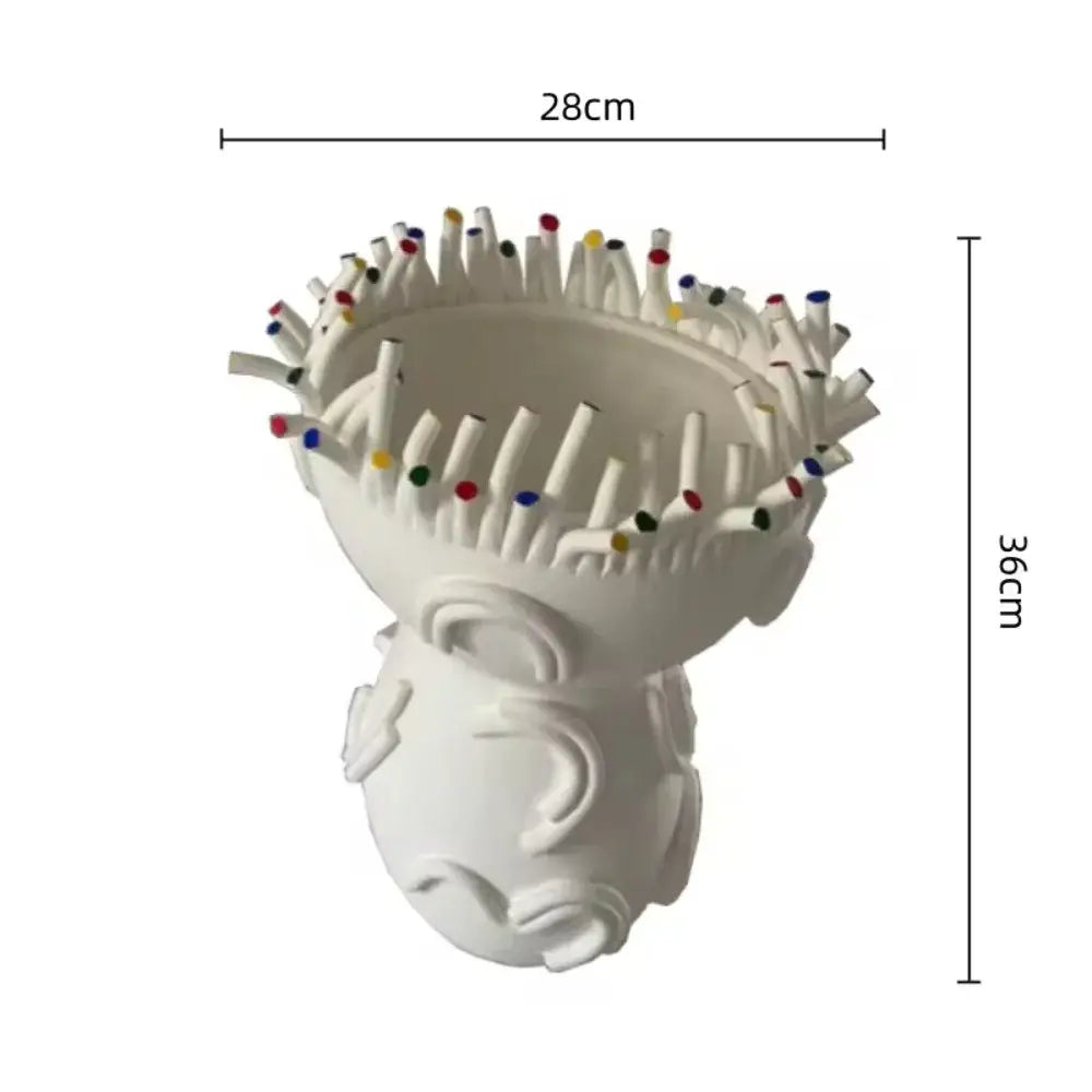 White ceramic flower pot vase with coral shapes and sculpted face design featuring colorful pencil-like rim decor