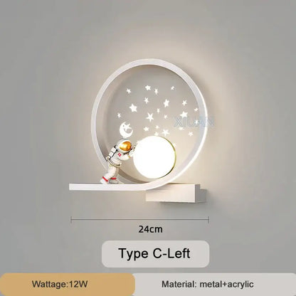 White crescent astronaut wall lamp with miniature astronaut holding glowing orb and star moon cutouts acrylic panel decorbites astronaut wall lamp