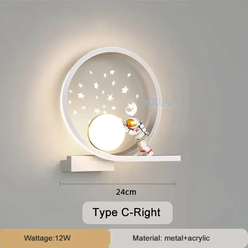 White crescent astronaut wall lamp with a miniature astronaut figurine and star-patterned acrylic panel for bedroom decorbites decor
