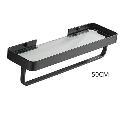 Black metal towel rack with clear glass shelf in white double tier glass corner shelf for bathroom use