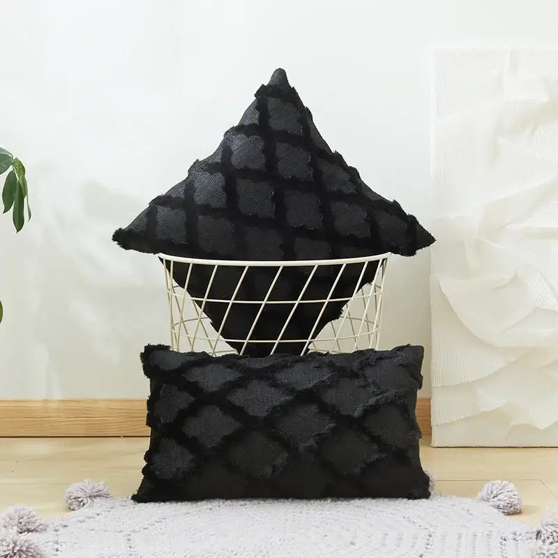 Black textured throw pillows with embroidered diamond cushion cover and frayed edges for living room decor