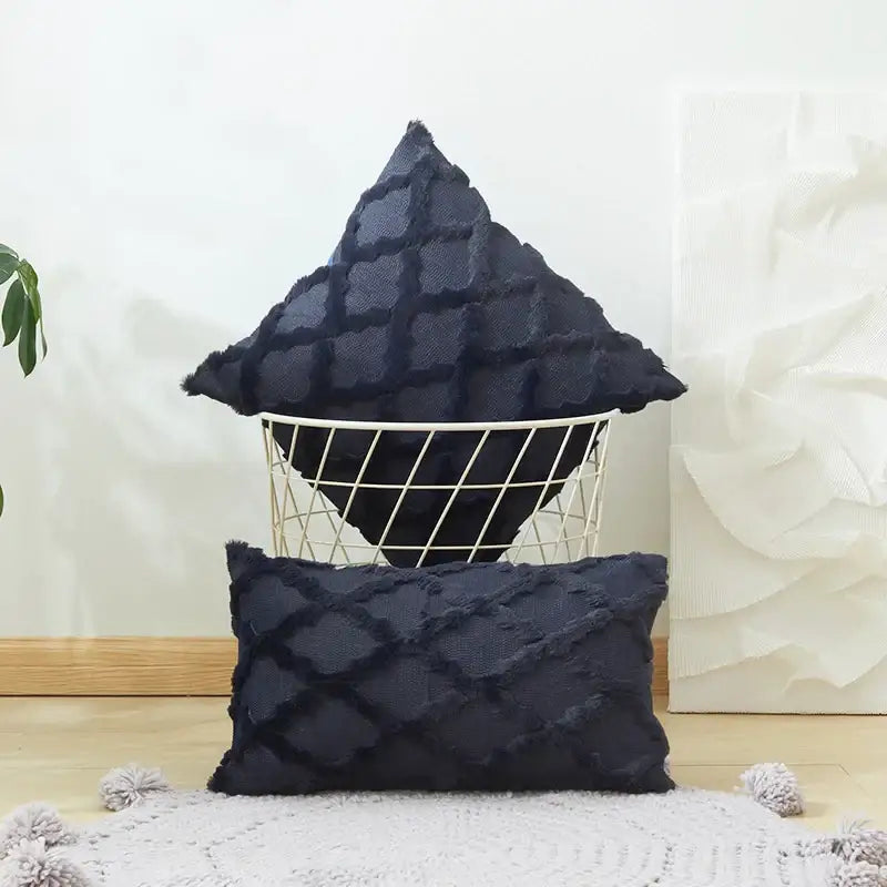 Dark navy blue textured throw pillows featuring a diamond cushion cover with frayed edges for living room decor