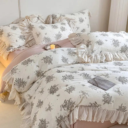 White floral cotton bedding set with lace ruffles featuring delicate gray floral patterns and ruffled edges