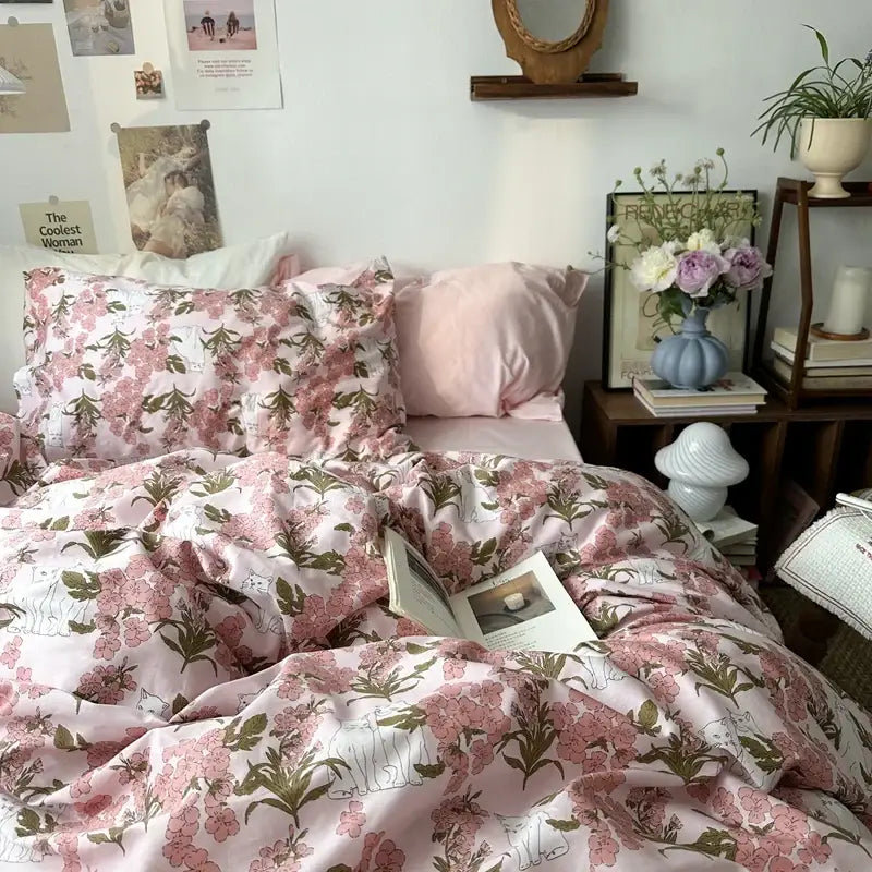 White floral embroidered cotton duvet cover set with pink blossoms and green leaves on soft satin-like fabric