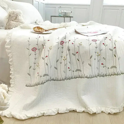 White fresh flower embroidered quilt set with soft pink red and gray floral embroidery on ruffled cotton bedding