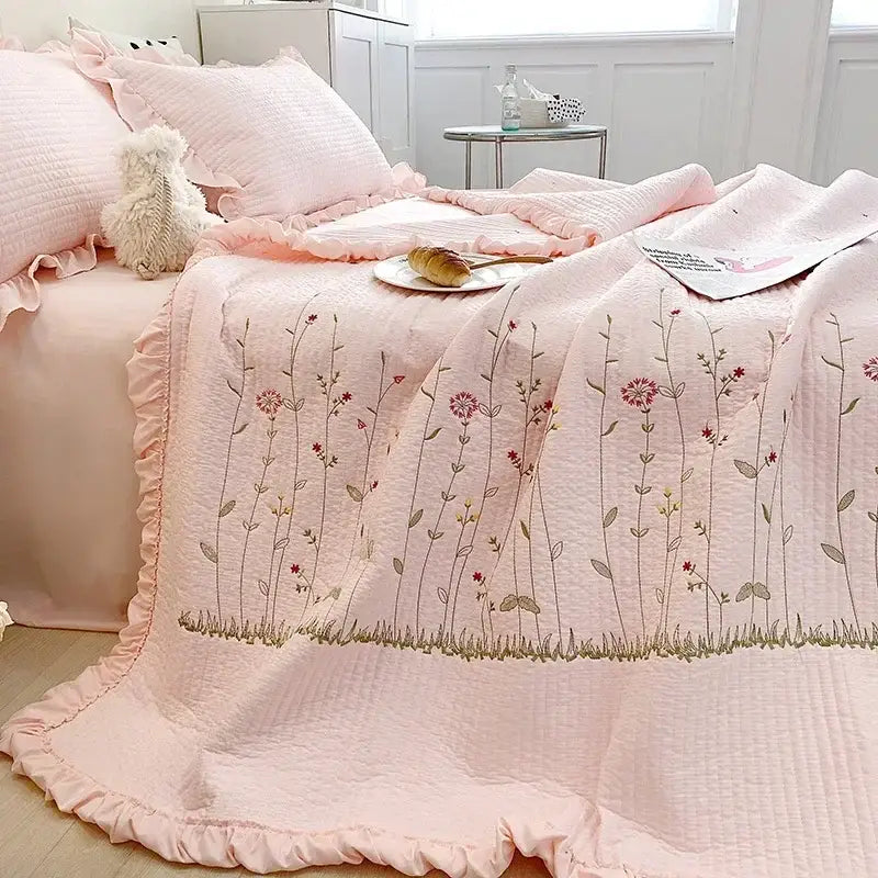 Pink quilted cotton bedspread with fresh flower embroidered ruffled edges from decorbites quilt set for bedroom decor