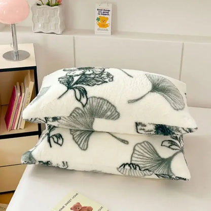 White ginkgo botanical cozy winter plush pillowcase with soft textured surface and dark green gray leaf pattern decorbites cozy winter