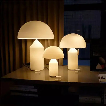 Three illuminated white glossy mushroom iron table lamps with opaque glass domes for bedroom decorbites iron table use