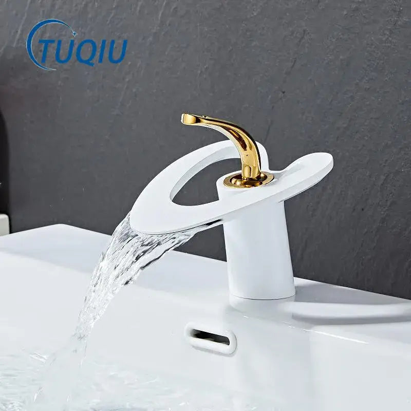 White and gold basin faucet with sleek curved spout modern waterfall design by decorbites golden white