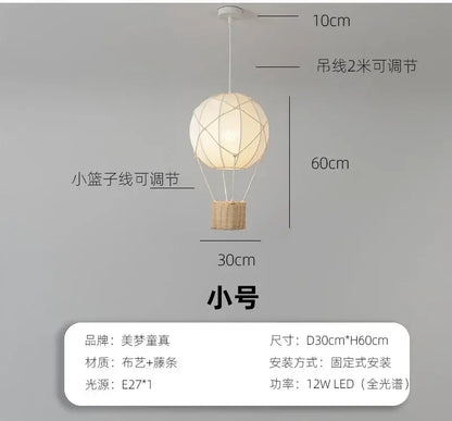 White hot air balloon chandelier kids room macrame pendant light with beige fabric body and woven basket base decorbites hot air